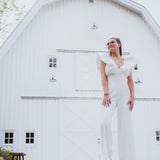 White Luxe Jumpsuit with Zipper Back + Puff Sleeve