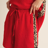 Red Shorts with Leo Stripe Accent