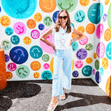 A crisp white twill vest that's equal parts polished and playful—those ruffled sleeves are the kind of detail that makes every outfit feel intentional. Button-down front, collar, and functional pockets.