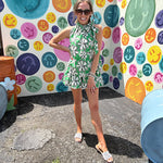 Cotton A line tank with drawstring neckline with tie in green with black and white abstract florals throughout.