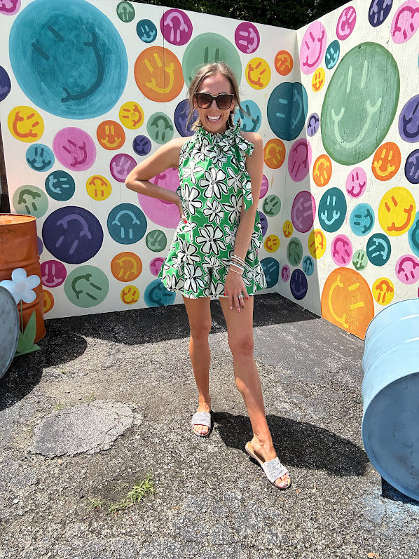 Cotton A line tank with drawstring neckline with tie in green with black and white abstract florals throughout.