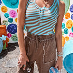 Ribbed texture deep U shaped neckline tank with striping detail and 1/4 button front, U shaped hem.