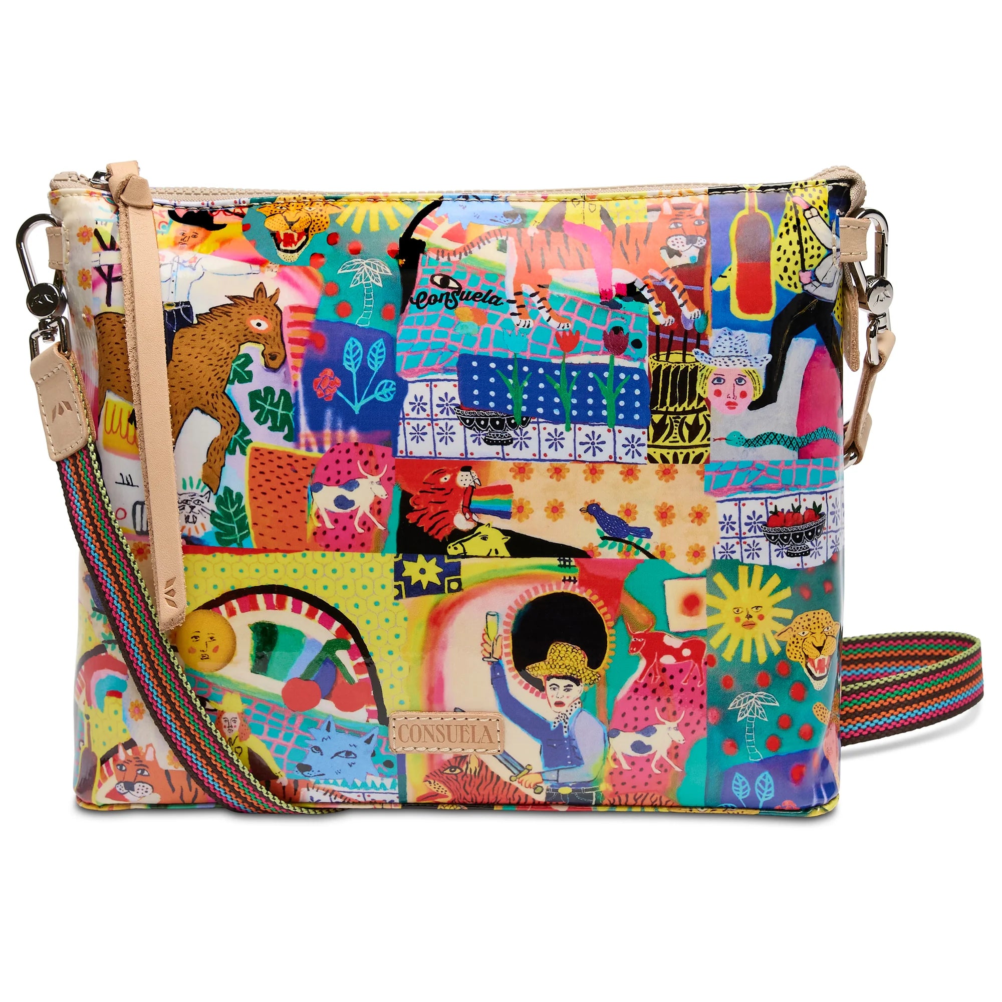Consuela downtown crossbody with zipper closure and bold, multi colored Consuela fabric exterior with animal, plant, sun and moon artwork.