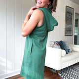 Terry-like forest green sleeveless hoodie dress with drawstring. Mini length.