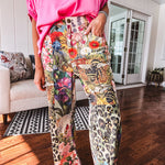 Cotton wide leg pants featuring an elastic back, button zipper closure and bright floral, bee and leopard print patchwork throughout with sparkling embellishments.