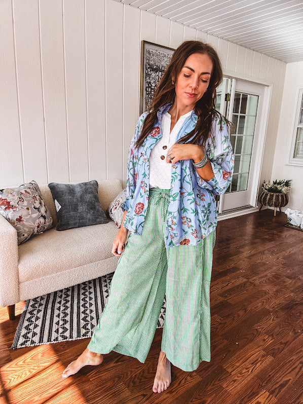 Lightweight green and white wide leg pants with elastic drawstring waist.