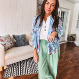 Lightweight green and white wide leg pants with elastic drawstring waist.