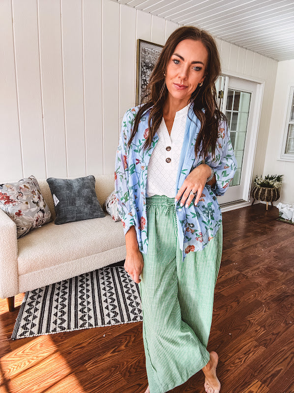 Lightweight green and white wide leg pants with elastic drawstring waist.