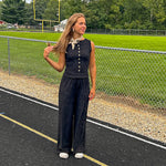 Black textured wide leg lounge pants with elastic waist.