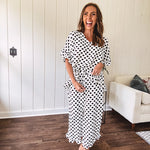 Lightweight, flowy wide leg pants with elastic drawstring waist and ruffled cuffs.