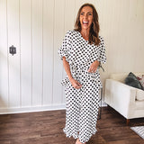 Lightweight, flowy wide leg pants with elastic drawstring waist and ruffled cuffs.