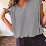Soft, black and white striped sleeveless top with bubble hem and shoulder padding.