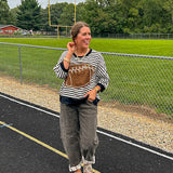 Dark grey and brown cheetah barrel pants.