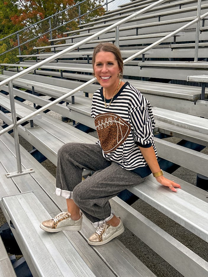 Dark grey and brown cheetah barrel pants.