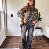 Lightweight button front camo jacket with olive and mustard colorway textured waffle weave on the sleeves and pockets, collar, metal buttons and tiny floral rivets throughout.