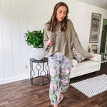 Chenille-like woven long sleeved sweater in light olive green with hoodie and matching rope ties with relaxed hem and fit.