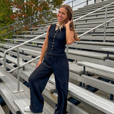 Black textured wide leg lounge pants with elastic waist.
