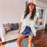 Oversized dolman 3/4 sleeve top with waffle texture.