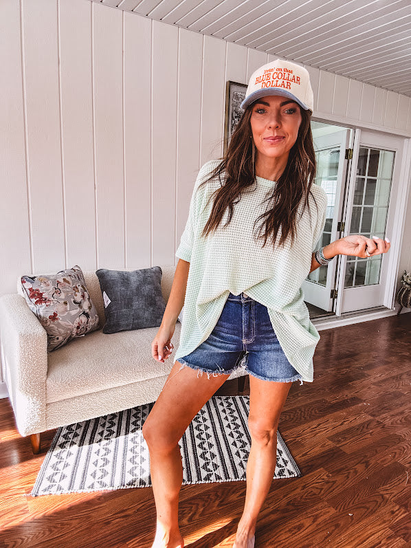 Oversized dolman 3/4 sleeve top with waffle texture.