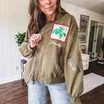 Olive classic bomber jacket with western inspired patchwork and embroidery throughout with zip up front and elastic waist, collar and cuffs.