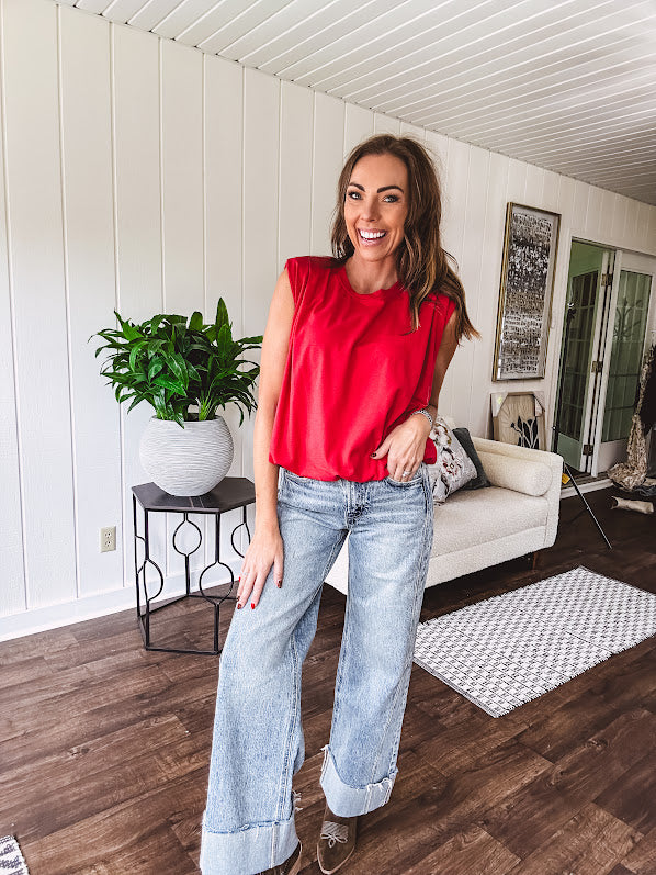 Cool red cotton blend bubble hem blouse tank with padded shoulders with shoulder pleats and round neck.