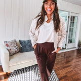 Buttery soft V neck short sleeved top with loose hem.