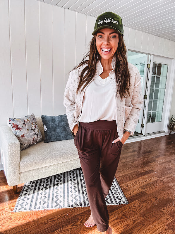 Buttery soft V neck short sleeved top with loose hem.