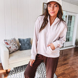 Modal soft 1/4 zip hoodie with kangaroo pocket and thumb holes in the cuffs.