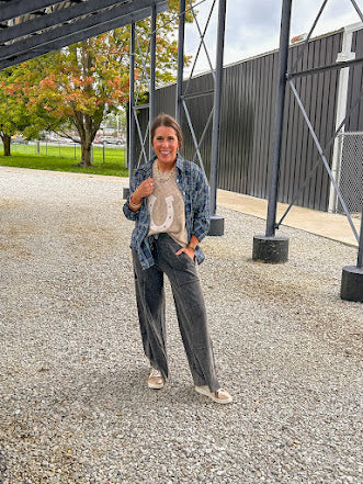 Black terry knit wide leg cargo pants with elastic waist.
