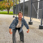 Black terry knit wide leg cargo pants with elastic waist.