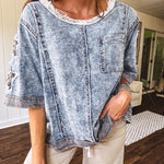 Crafted from a soft cotton-blend in a medium wash, this short-sleeved shirt features eye-catching floral and ribbed patchwork details that make it impossible to ignore. The relaxed fit, seam detailing, and front pocket keep things effortlessly comfortable, while the textured cuffs and hem add that signature boho edge.