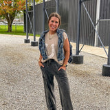 Black terry knit wide leg cargo pants with elastic waist.