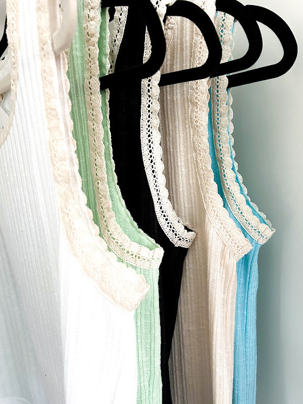 Ribbed textured tank with eyelet crocheted trim. Available in many colors
