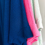 Oversized dolman 3/4 sleeve top with waffle texture.