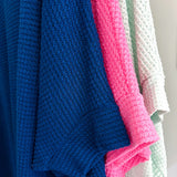 Oversized dolman 3/4 sleeve top with waffle texture.