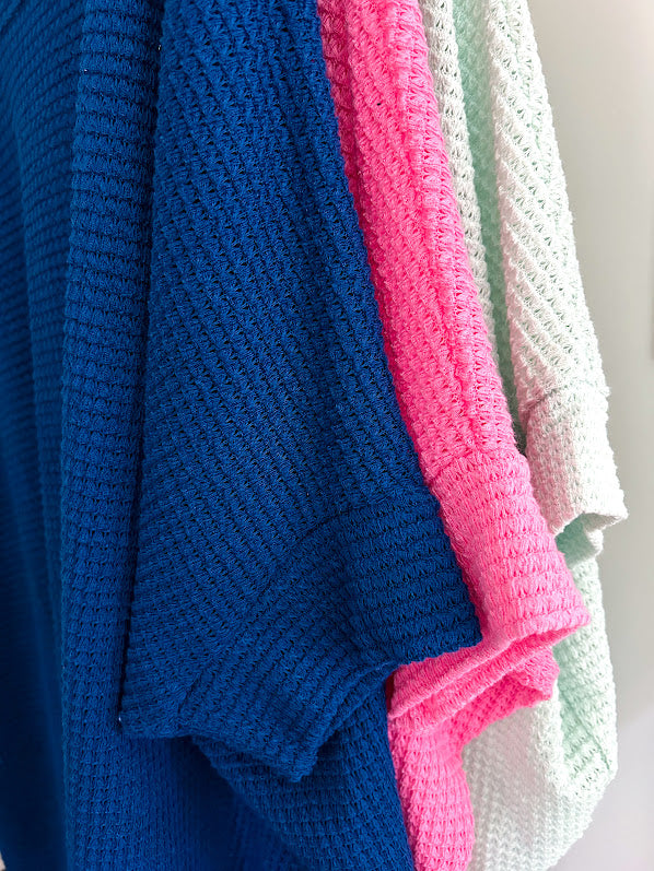 Oversized dolman 3/4 sleeve top with waffle texture.