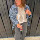 Blue, black and green plaid flannel button down shirt.