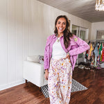 Washed orchid lightweight snap button top with exposed seams and groovy patches throughout.