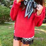 Soft, fuzzy cool red mock neck sweater with wide ribbed neck, cuffs and hem. 