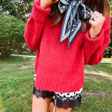 Soft, fuzzy cool red mock neck sweater with wide ribbed neck, cuffs and hem. 