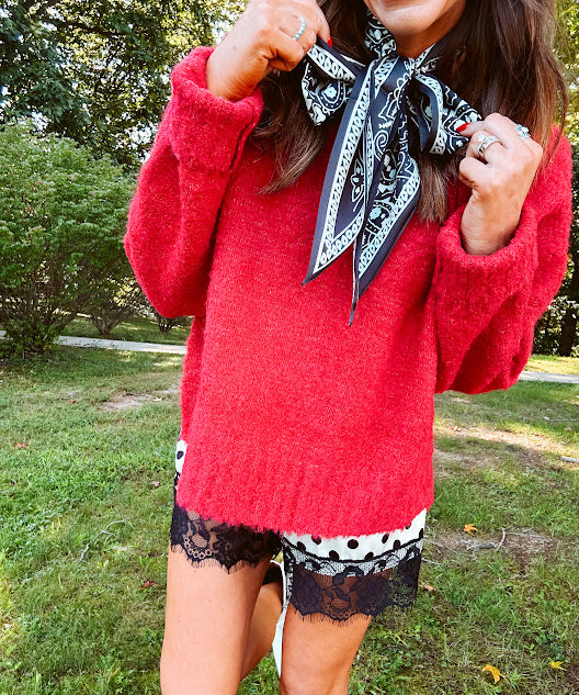 Soft, fuzzy cool red mock neck sweater with wide ribbed neck, cuffs and hem. 