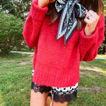 Soft, fuzzy cool red mock neck sweater with wide ribbed neck, cuffs and hem. 