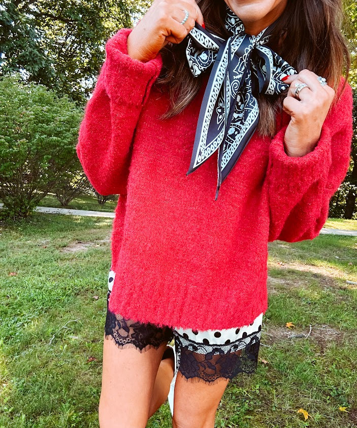 Soft, fuzzy cool red mock neck sweater with wide ribbed neck, cuffs and hem. 
