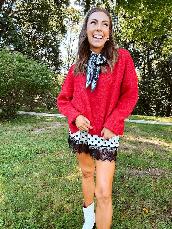 Soft, fuzzy cool red mock neck sweater with wide ribbed neck, cuffs and hem. 