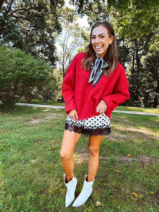 Soft, fuzzy cool red mock neck sweater with wide ribbed neck, cuffs and hem. 