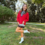 Soft, fuzzy cool red mock neck sweater with wide ribbed neck, cuffs and hem. 