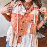 Washed terry like orange brick fabric vest with lace and mixed textured patches, a tiered, flowy bottom, snap button front, hoodie and pockets.