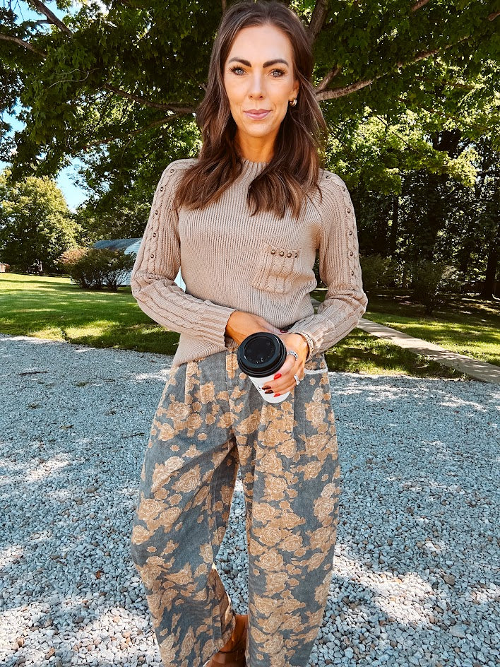 Lightweight mocha long sleeved sweater with ribbed mock neck and sleeves with antique brass rivet detail.
