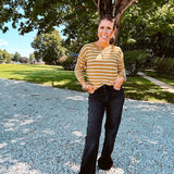 Lightweight, thin, soft striped crewneck long sleeved sweater.