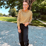 Lightweight, thin, soft striped crewneck long sleeved sweater.